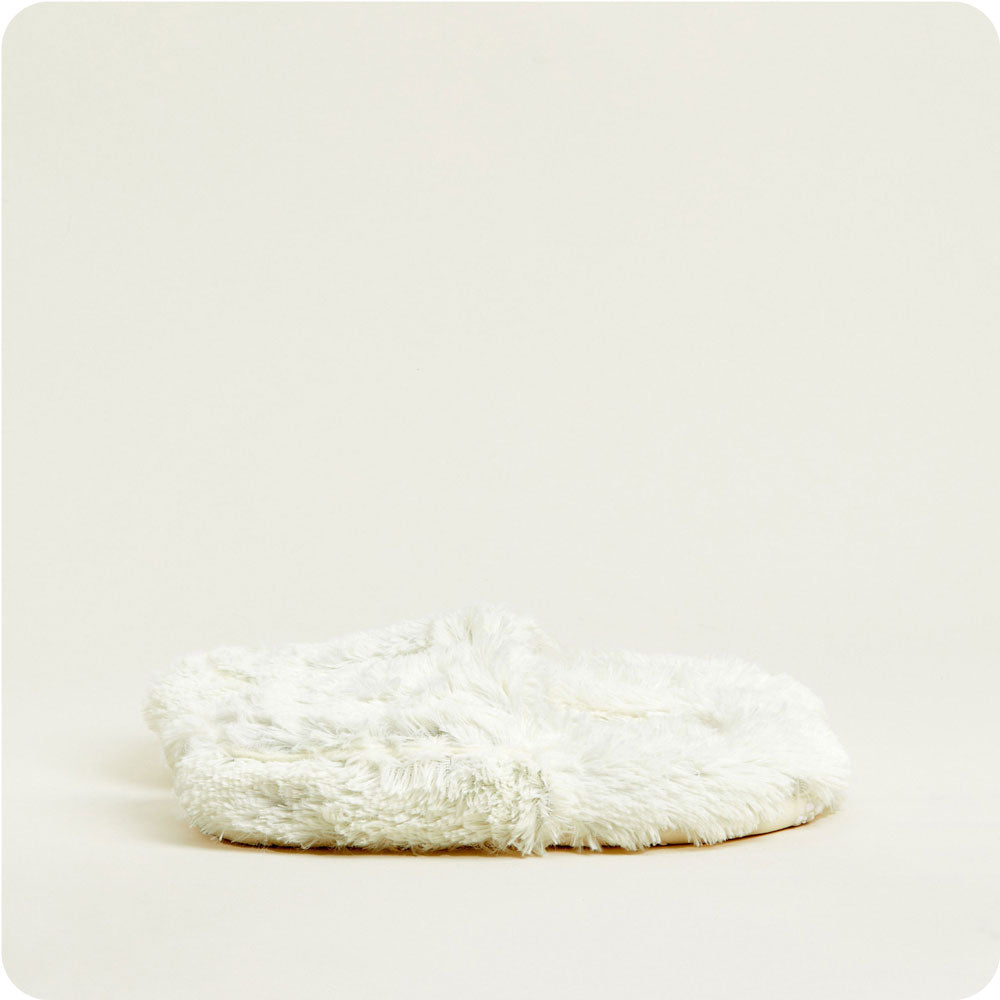 Image 94: Indulge in warmth with Microwavable Cream Slippers by Warmies USA.