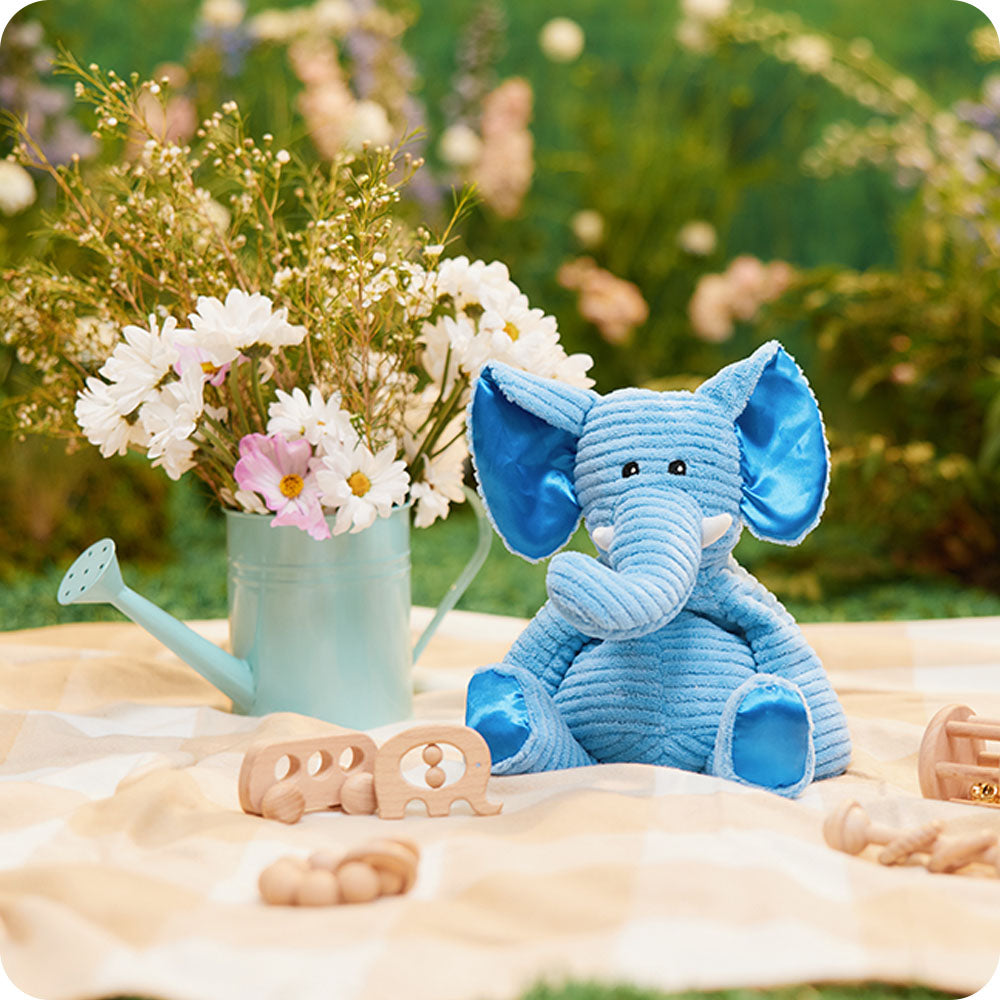 Image 100: my first warmies elephant in a garden picnic setting