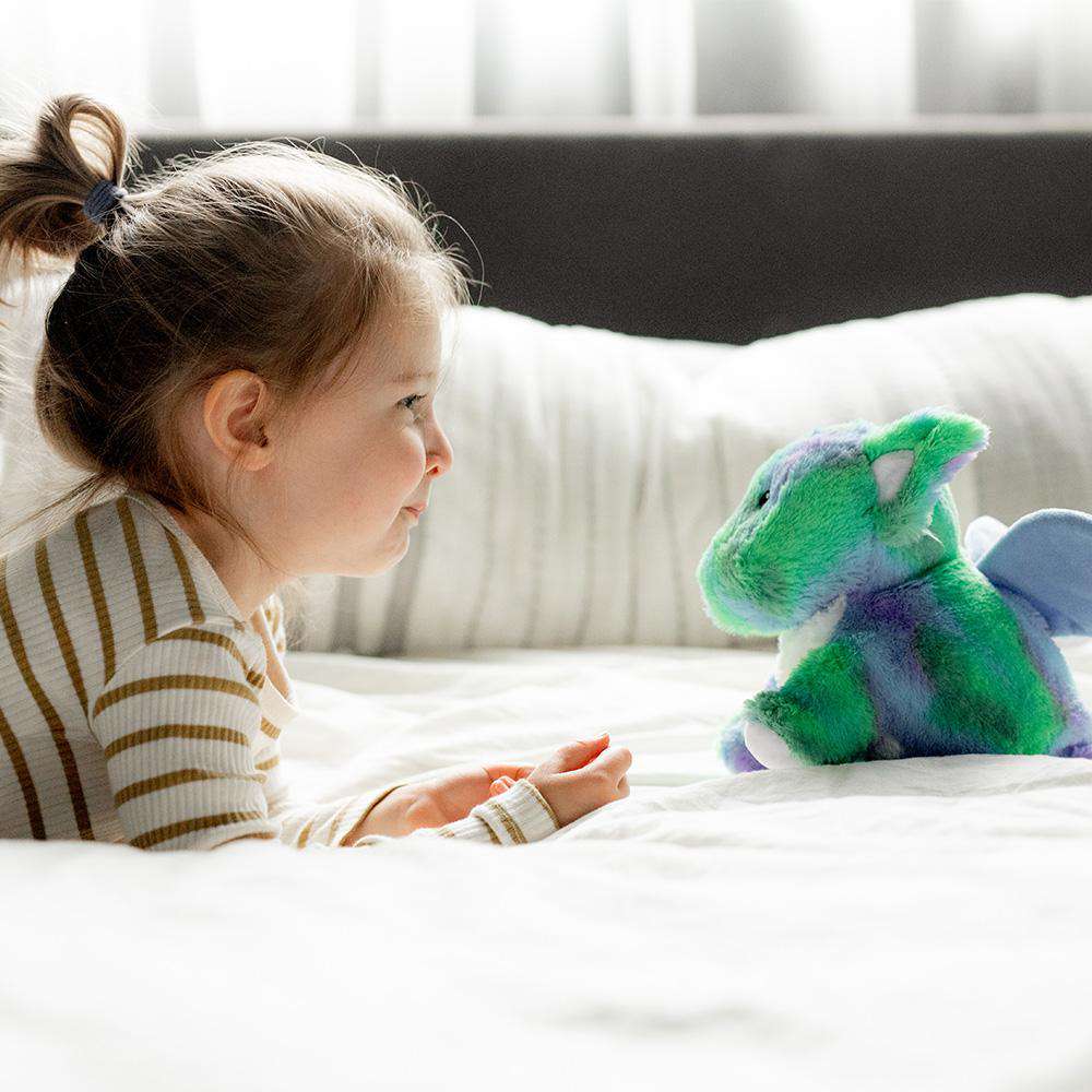 Image 104: Little girl looking at Cute Weighted Lavender Scented Baby Dragon Stuffed Animal Heating Pad Warmies