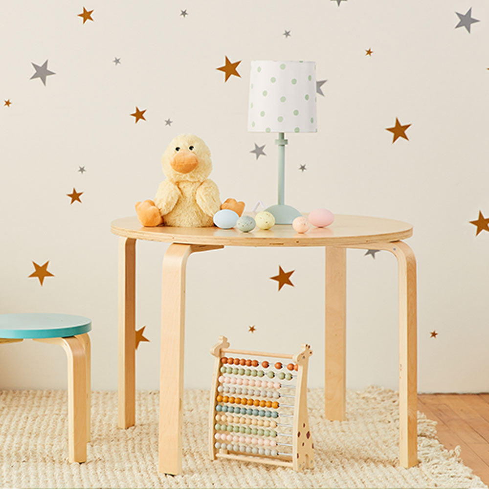 Image 101: duck stuffed animal on table in kids room