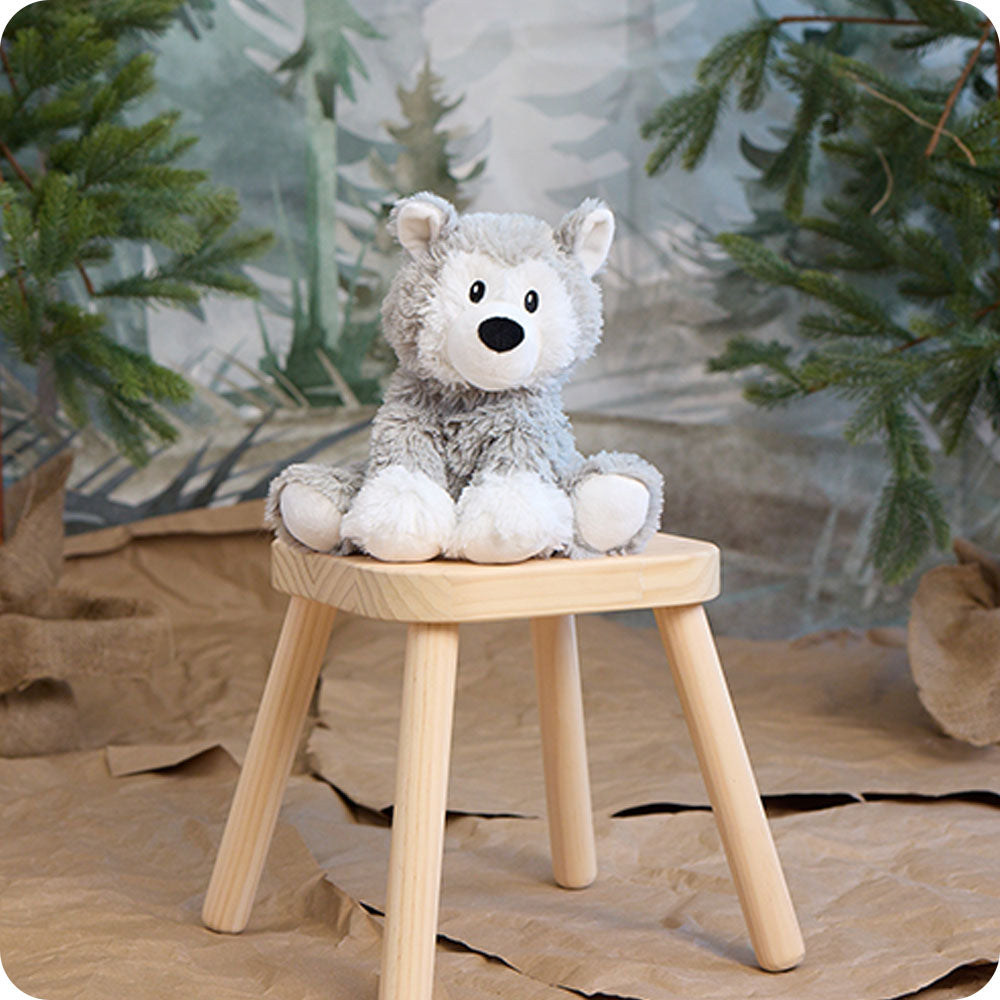 Image 106: woodland scene with husky stuffed animal