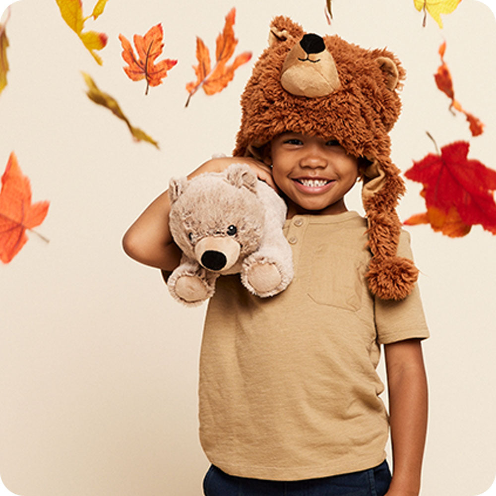 Image 103: brown bear warmies stuffed animal autumn lifestyle