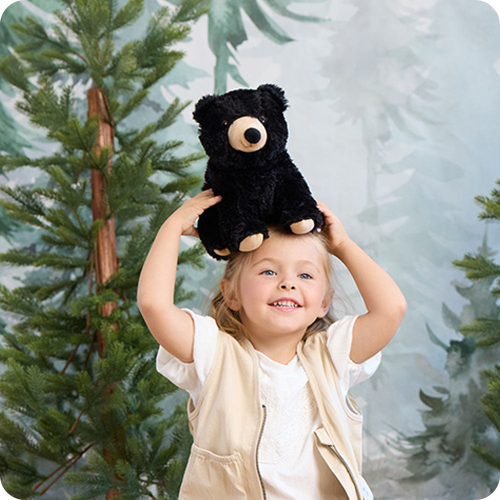 Image 99: black bear warmies lifestyle