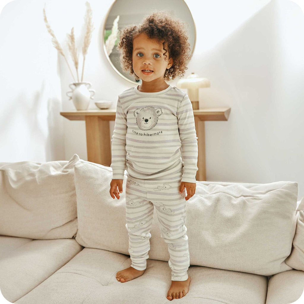 Image 87: Toddler standing and wearing Marshmallow Bear Pajamas - Warmies USA