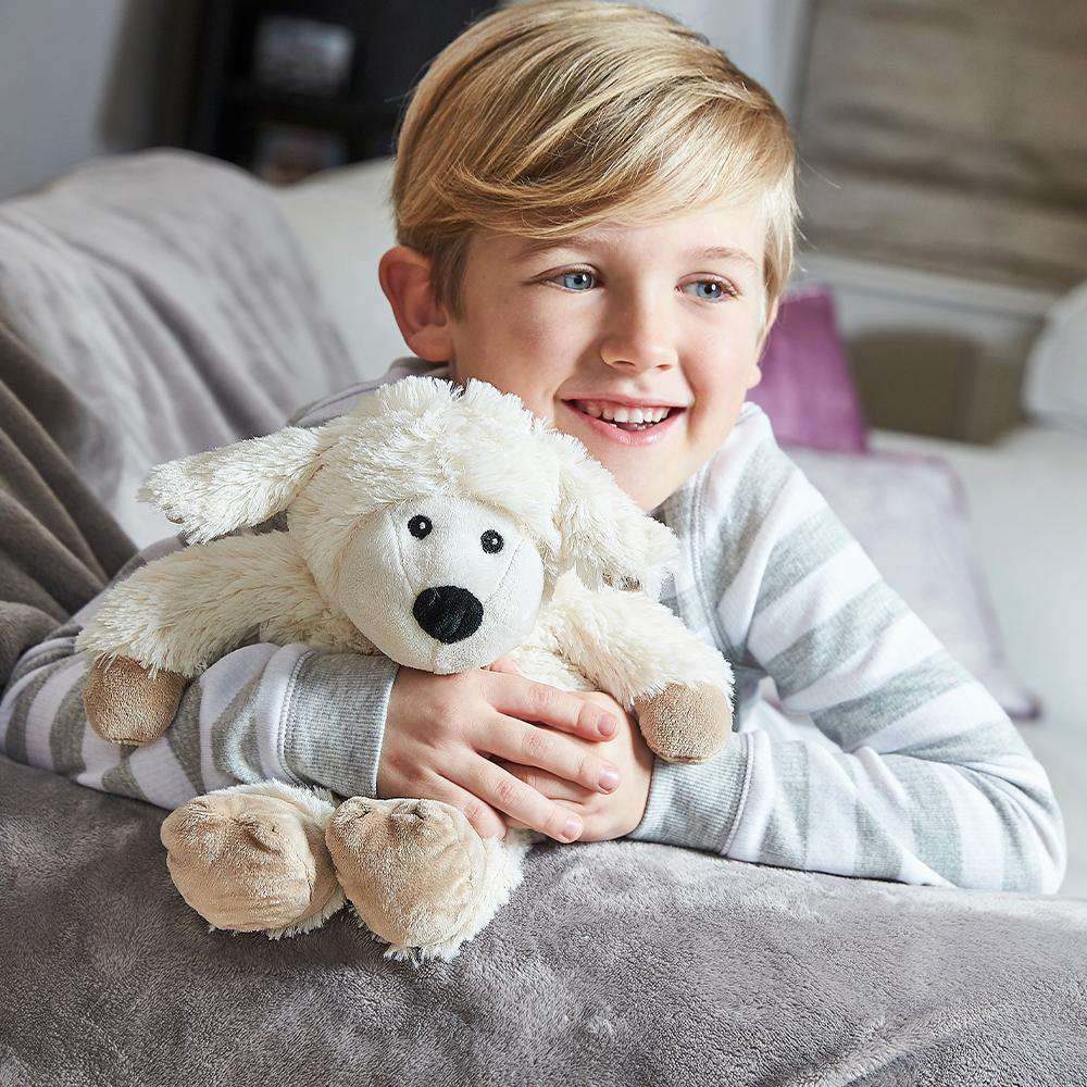 Image 98: Boy hugging Heated Sheep Plush Warmies