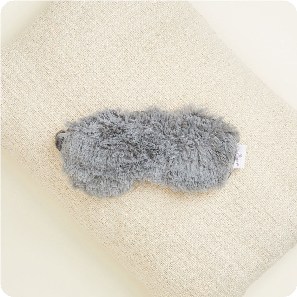 Image 91: Indulge in warmth with Microwavable Gray Eye Mask by Warmies USA.