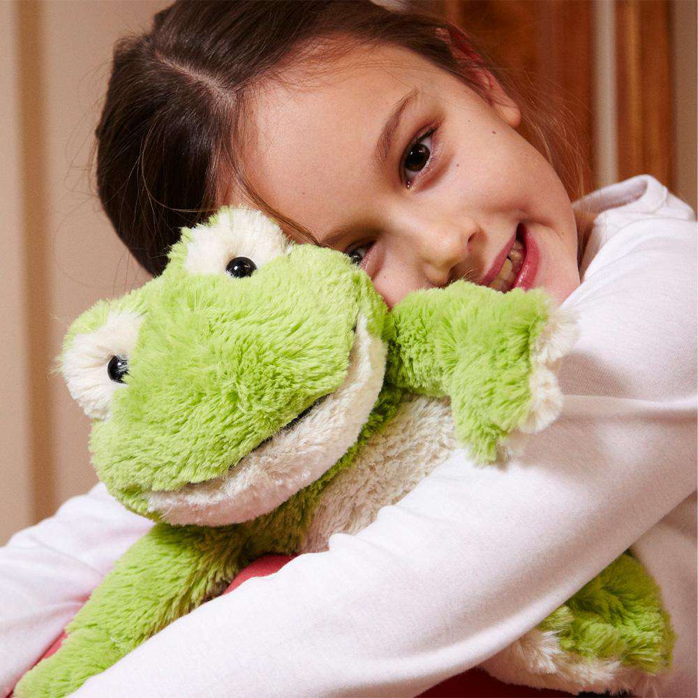 Image 99: Girl hugging Cute Weighted Lavender Scented Frog Stuffed Animal Heating Pad Warmies
