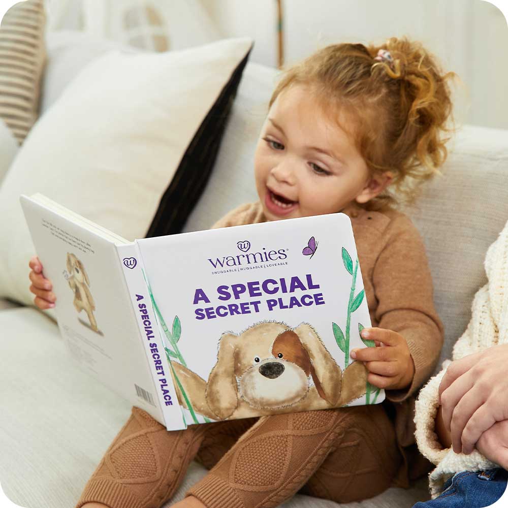 Image 95: Little girl reading A Special Secret Place Board Book - Warmies USA
