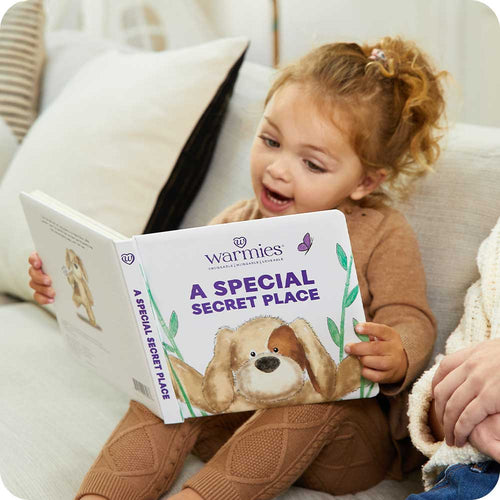 Image 95: Little girl reading A Special Secret Place Board Book - Warmies USA