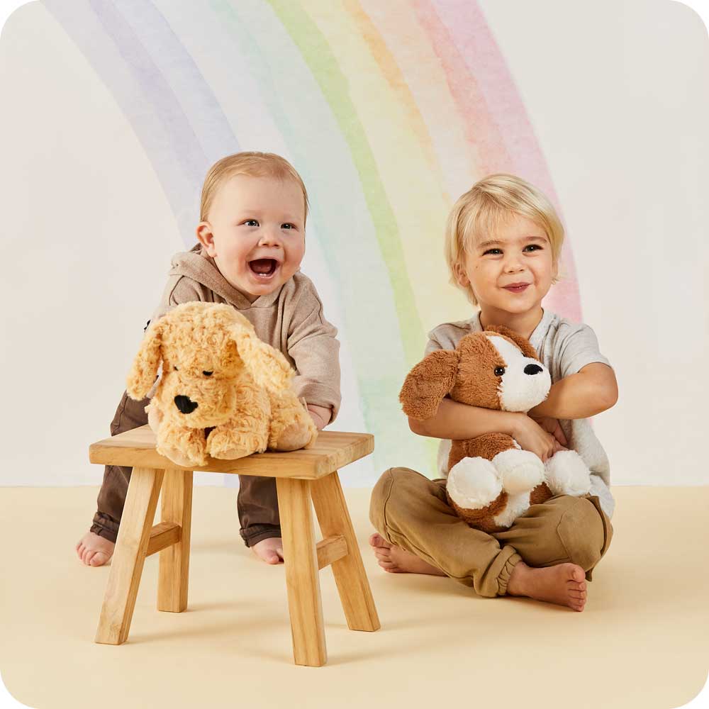 Image 104: Brothers sitting and smiling with Cute Weighted Lavender Scented Beagle Stuffed Animal Heating Pad Warmies