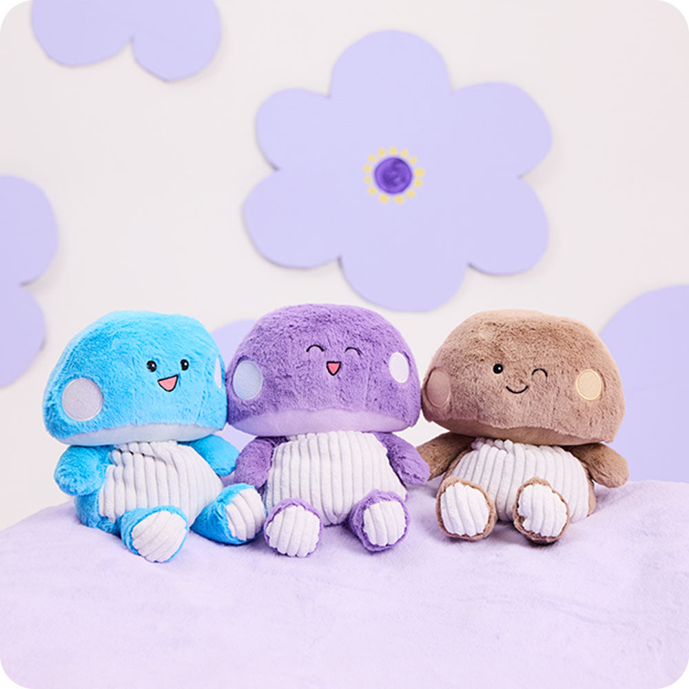 Image 105: blue, purple, and brown mushroom trio stuffed animals