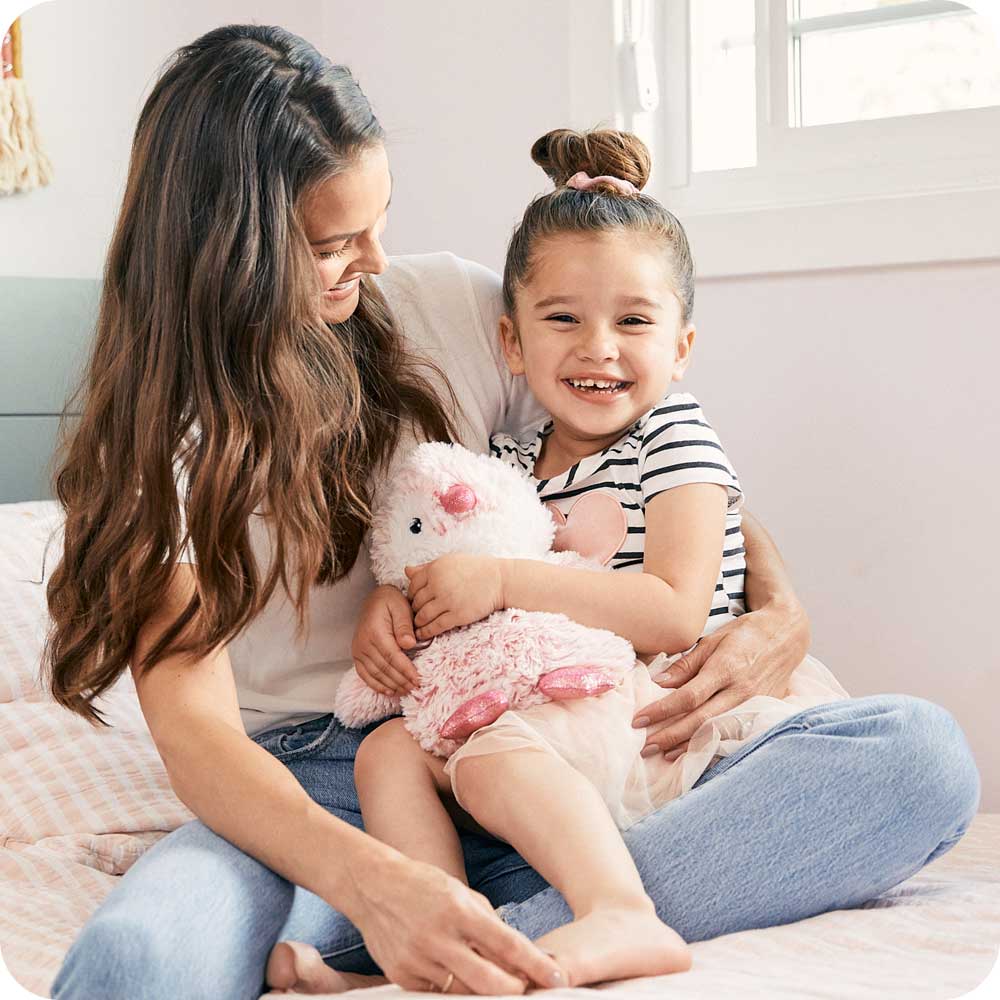Image 100: Mother and daughter holding Cute Weighted Lavender Scented Pink Penguin Stuffed Animal Heating Pad Warmies
