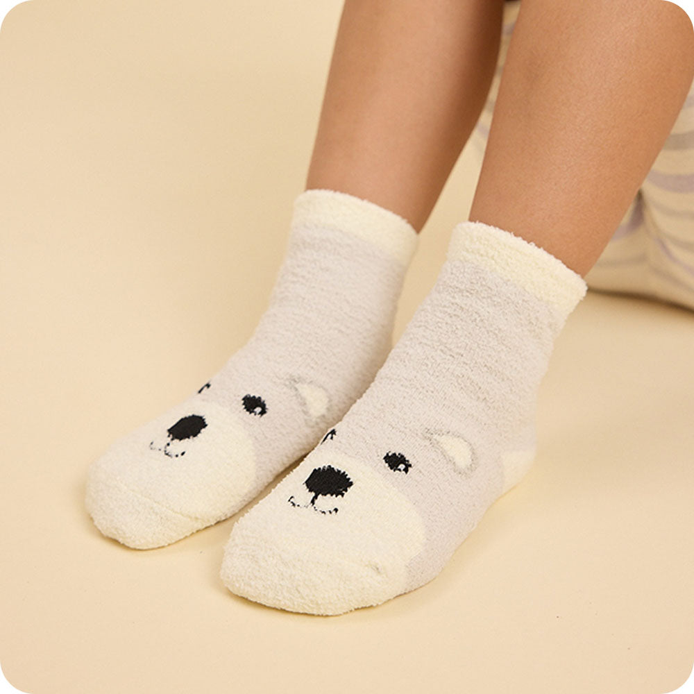 Image 109: close up bear socks on feet