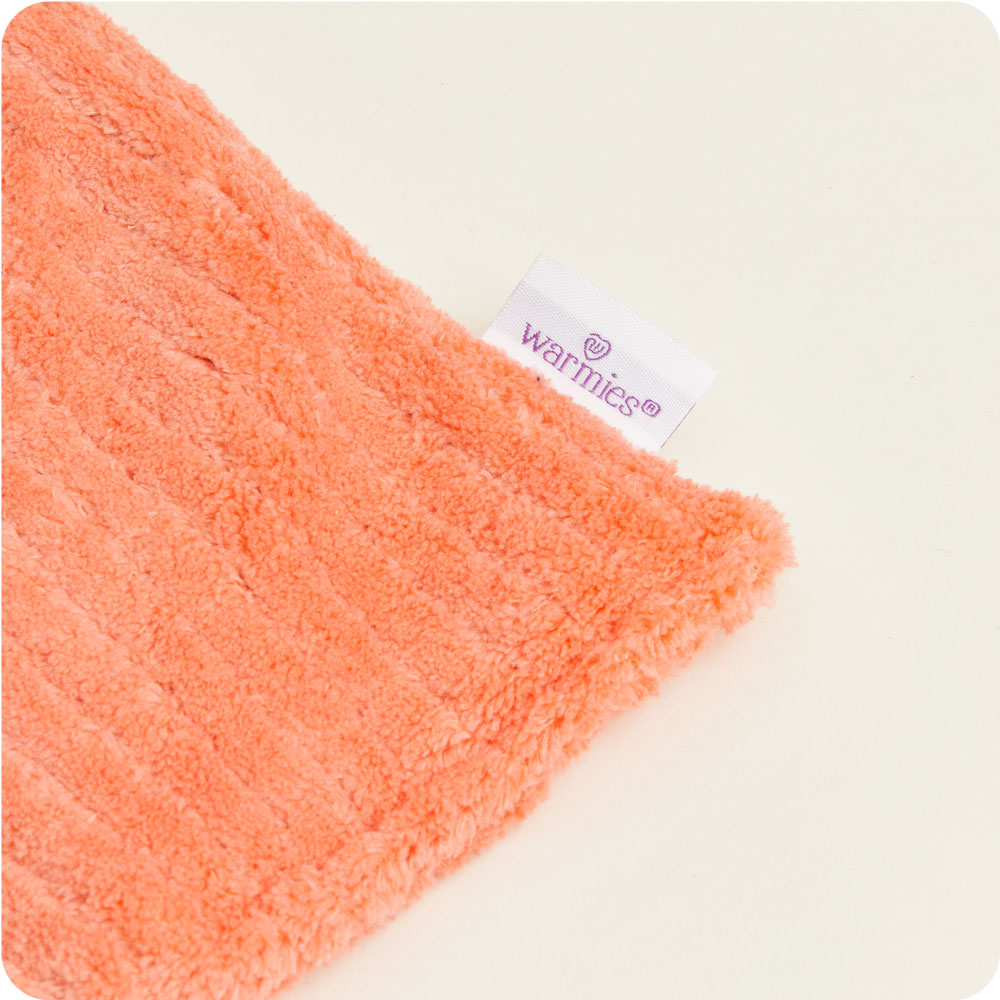 Image 80: Revitalize with Warmies USA's Living Coral Hot-Pak®—microwave, embrace, and unwind in luxury.