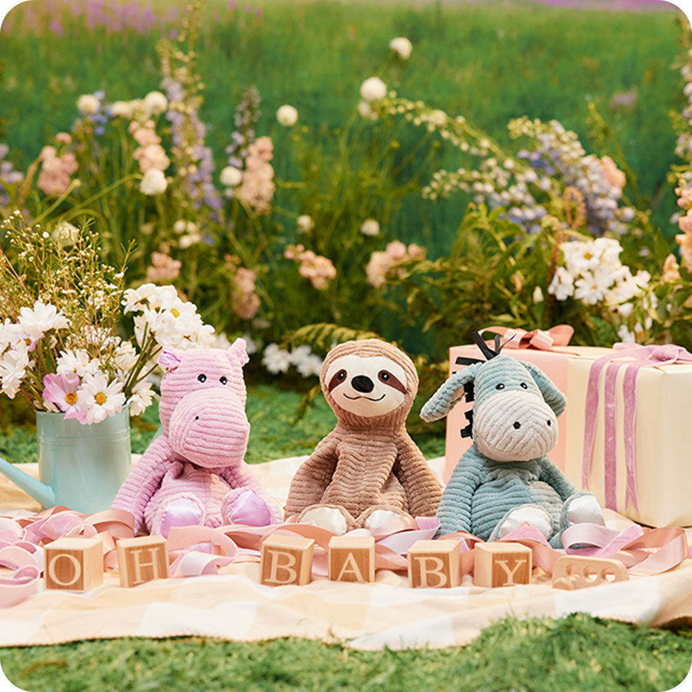 Image 105: my first warmies trio pig, sloth, and donkey in garden picnic setting