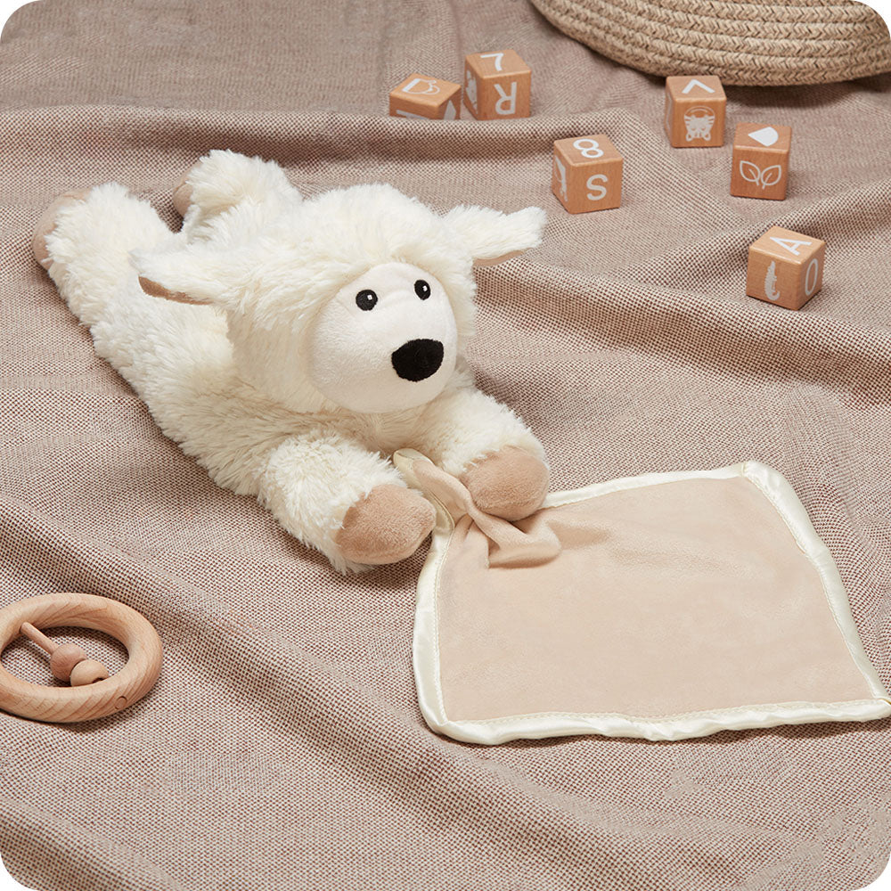 Image 95: warmies sheep blankie lifestyle with kids blocks