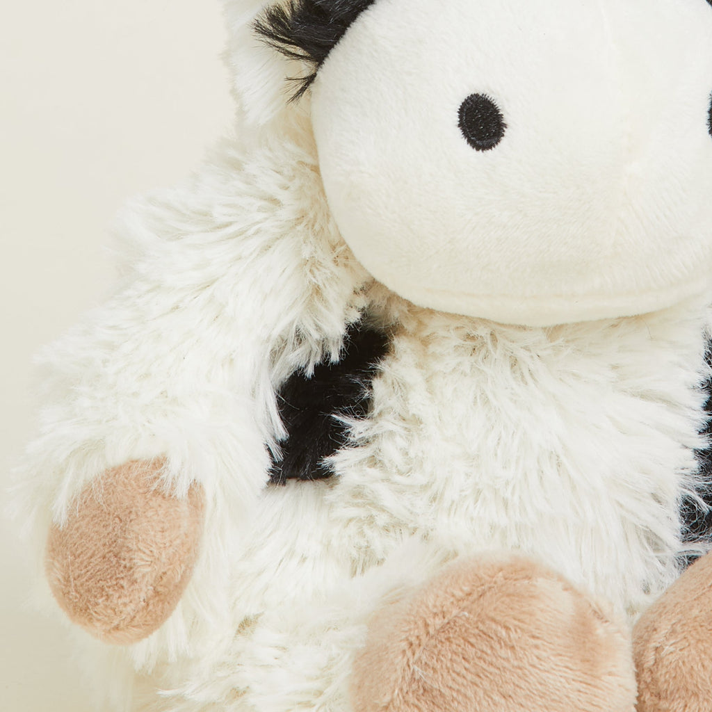 Image 101: Soft Warm Weighted Black and White Cow Plush Warmies Junior