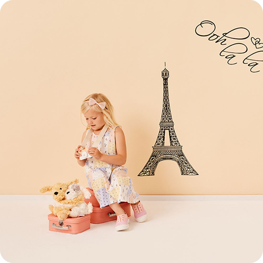 Image 100: girl playing with puppy hugs warmies