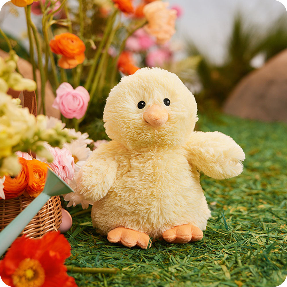 Image 104: chick stuffed animal in a garden picnic setting