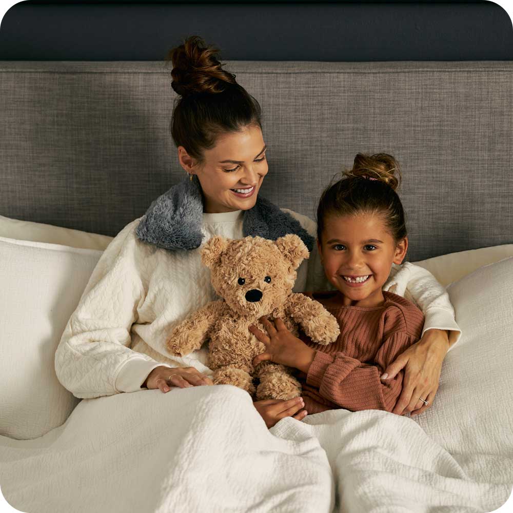 Image 89: Mother and daughter cuddling while wearing Soft Cozy Heatable Gray Warmies Neck Wrap